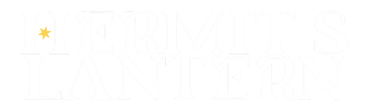 White capital letters read “Hermit’s Lantern”. A yellow six pointed star forms part of the H in Hermit.